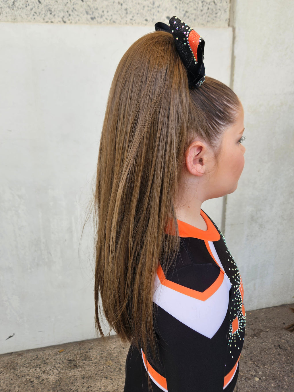 Light brown cheermate cheer pony hair extension